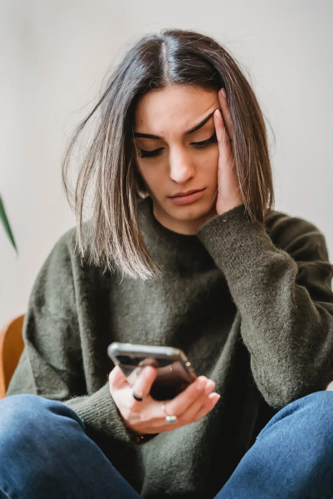 Surrogate woman looking at her phone